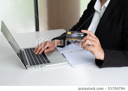 Business woman consumer holding credit card Business woman consumer holding credit card 55709794
