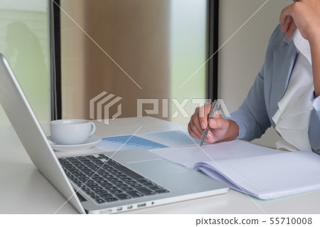 business leader woman analyzing the charts 55710008