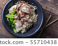 Traditional Thai egg noodles on wooden table top 55710438