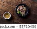 Traditional Thai egg noodles on wooden table top 55710439