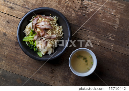 Traditional Thai egg noodles on wooden table top 55710442
