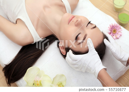 Skin And Body Care. Close-up Of A Young Woman Getting Spa Treatment At Beauty Salon. Spa Face 55710877