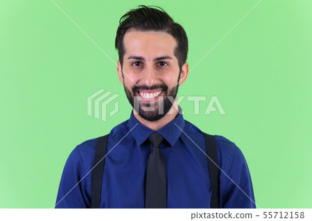 Face of young happy bearded Persian businessman smiling Face of young happy bearded Persian businessman smiling 55712158