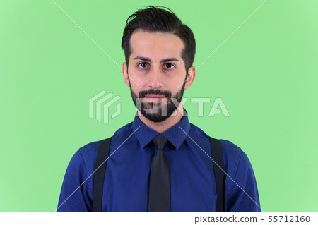Face of young handsome bearded Persian businessman Face of young handsome bearded Persian businessman 55712160
