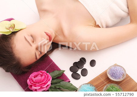 Spa. Care Facial. Beautiful Young Woman Getting a Face Treatment at Beauty Salon Spa. Care Facial. Beautiful Young Woman Getting a Face Treatment at Beauty Salon 55712790