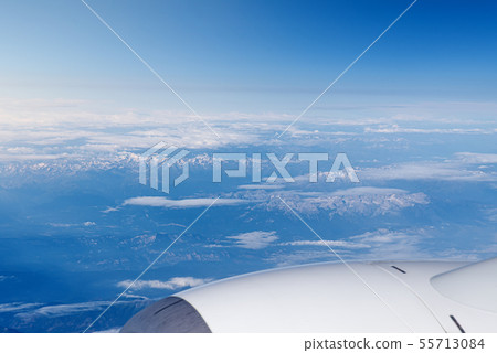 Endless cloudy sky, view from the airplane. Endless cloudy sky, view from the airplane. 55713084