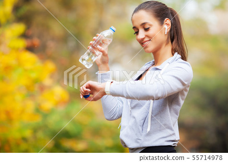 Sports woman after sports exercises in the urban environment. Sports woman after sports exercises in the urban environment. 55714978