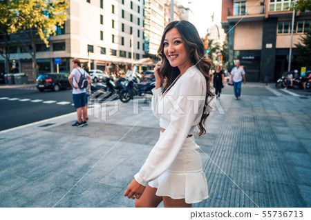 portrait of young stylish asian girl on the street of big modern city portrait of young stylish asian girl on the street of big modern city 55736713