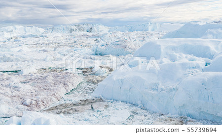 Drone image of Iceberg and ice from glacier in nature landscape Greenland Drone image of Iceberg and ice from glacier in nature landscape Greenland 55739694