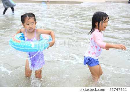 Girl bathing in the sea 55747531