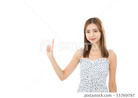 Young woman pointing 55769797