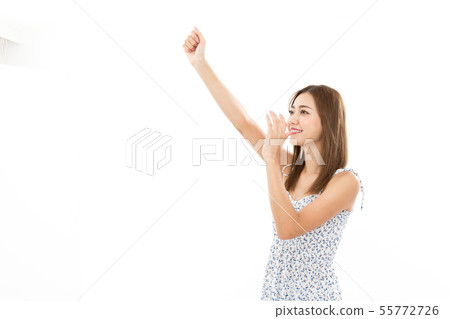 Cheering young woman 55772726