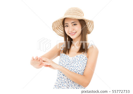 Young woman dazzling ultraviolet rays 55772733