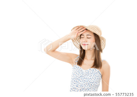 Young woman dazzling ultraviolet rays Young woman dazzling ultraviolet rays 55773235