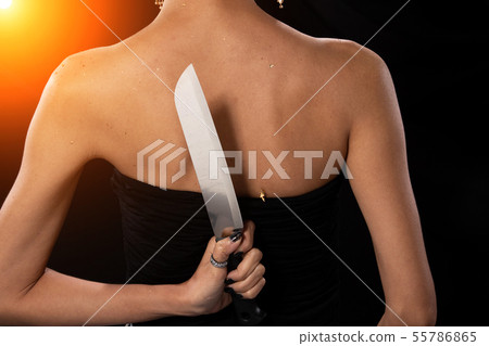 Asian Woman long hair hold Kitchen Knife in hand 55786865