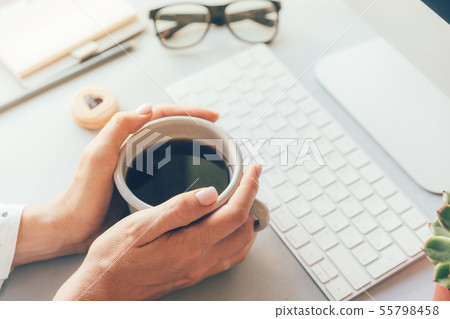 Coffee break in the office at the workplace: close 55798458