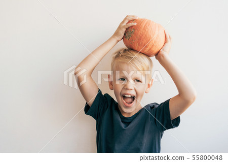 Caucasian boy is fooling around Caucasian boy is fooling around 55800048