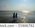 Twin girls back view coast 55806782