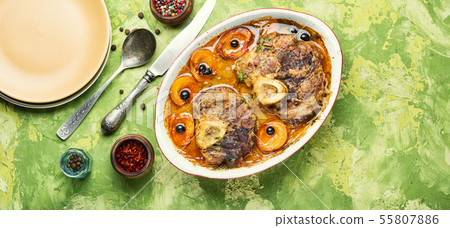 Meat cooked in apricot sauce Meat cooked in apricot sauce 55807886