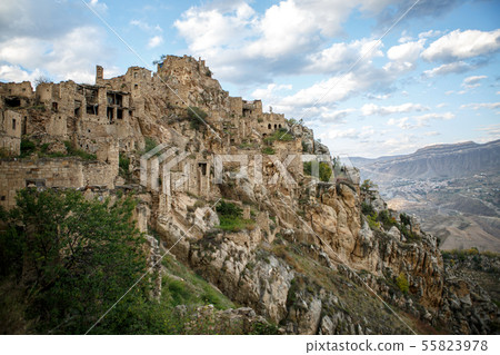 Photo of ancient ruins, mountain area on background of cloudy sky Photo of ancient ruins, mountain area on background of cloudy sky 55823978