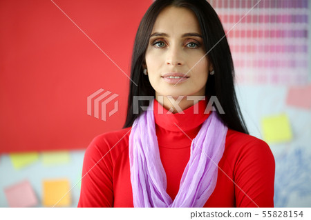 Serious brunette business lady in red 55828154