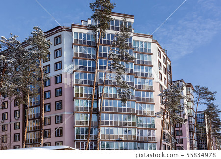multi-storey house among the trees 55834978