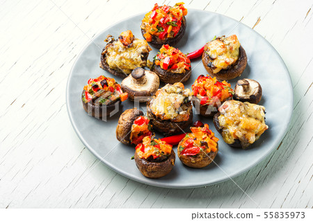 Mushrooms stuffed with vegetables Mushrooms stuffed with vegetables 55835973