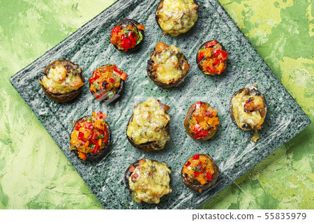 Mushrooms stuffed with vegetables Mushrooms stuffed with vegetables 55835979