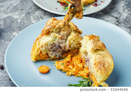 Chicken drumstick baked in dough Chicken drumstick baked in dough 55844046