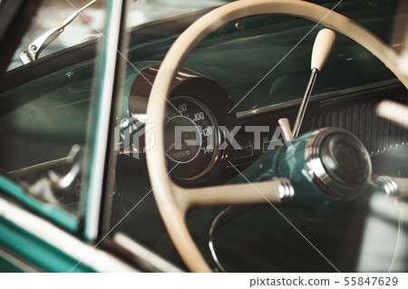 Retro car steering wheel and dashboard 55847629