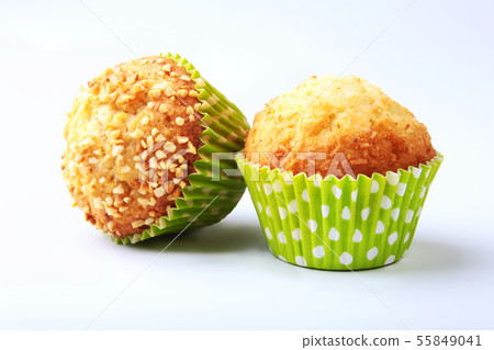 Assorted with Delicious homemade cupcakes with raisins and chocolate isolated on white background Assorted with Delicious homemade cupcakes with raisins and chocolate isolated on white background 55849041