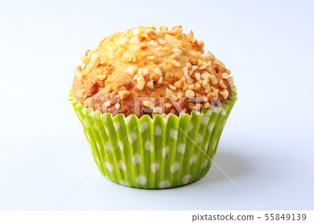 Assorted with Delicious homemade cupcakes with raisins and chocolate isolated on white background Assorted with Delicious homemade cupcakes with raisins and chocolate isolated on white background 55849139