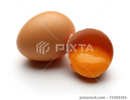 Broken chicken eggs with yolk isolated 55888365