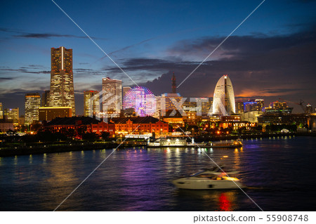 Yokohama cityscape in Japan Views of Yokohama Minato Mirai 21 and lightning that dyes the sky red (right back of the screen), etc. (night view) Yokohama cityscape in Japan Views of Yokohama Minato Mirai 21 and lightning that dyes the sky red (right back of the screen), etc. (night view) 55908748
