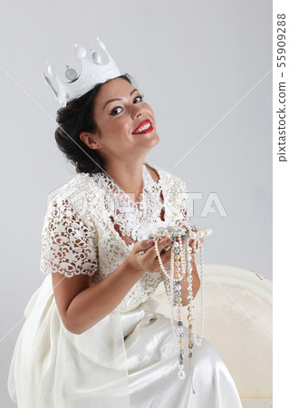 Portrait of tanned woman in crown Portrait of tanned woman in crown 55909288