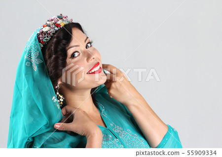 Adult woman in arabian dress Adult woman in arabian dress 55909334