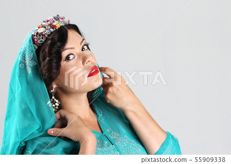 Adult woman in arabian dress Adult woman in arabian dress 55909338