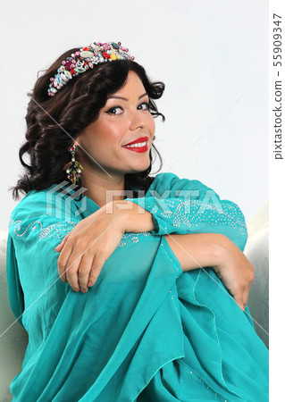Arabian woman on sofa 55909347