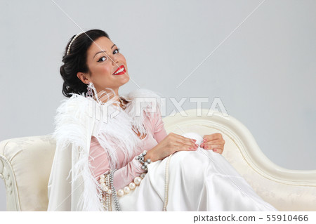 Beautiful woman on sofa Beautiful woman on sofa 55910466