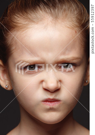 Close up portrait of a little emotional girl 55912397