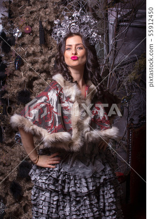 Christmas concept. Pretty woman in vintage dress. Christmas concept. Pretty woman in vintage dress. 55912450
