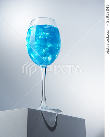 Delicious blue cocktail with ice-cubes Delicious blue cocktail with ice-cubes 55912849