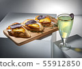 Delicious cocktail with canapes 55912850