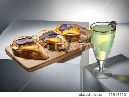 Delicious cocktail with canapes Delicious cocktail with canapes 55912850