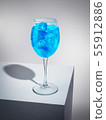 Exquisite blue cocktail with ice-cubes 55912886