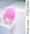 Delicious rosy beverage with sparkles 55912890