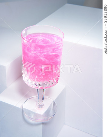 Delicious rosy beverage with sparkles Delicious rosy beverage with sparkles 55912890
