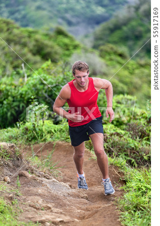 Athlete runner trail running on mountain nature 55917169