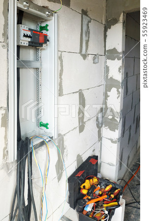 A new electric shield is installed on the wall of A new electric shield is installed on the wall of 55923469