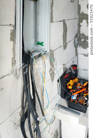 A new electric shield is installed on the wall of A new electric shield is installed on the wall of 55923470